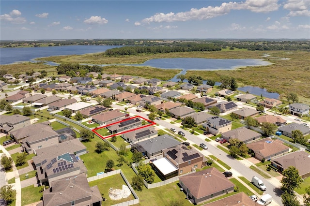 480 Kestrel Dr, Groveland, FL 34736 - aerial perspective of suburban area featuring a large body of water and property boundaries highlighted