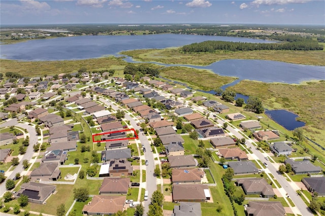480 Kestrel Dr, Groveland, FL 34736 - aerial view of property's location with a large body of water and nearby suburban area