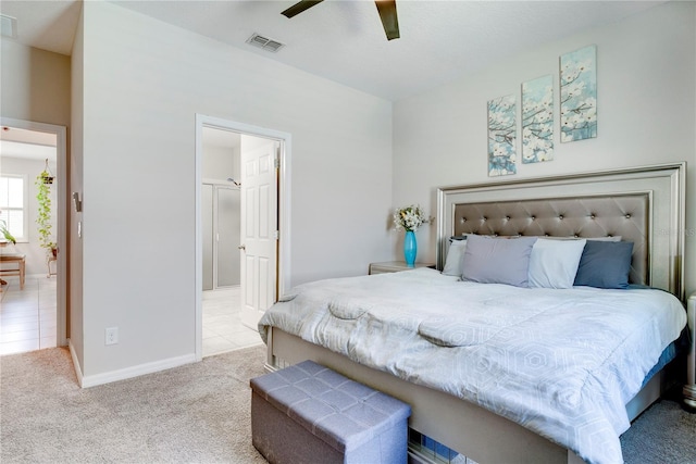 480 Kestrel Dr, Groveland, FL 34736 - bedroom featuring carpet, ensuite bath, and a ceiling fan