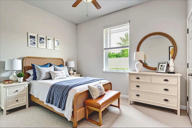 480 Kestrel Dr, Groveland, FL 34736 - bedroom with light colored carpet and a ceiling fan