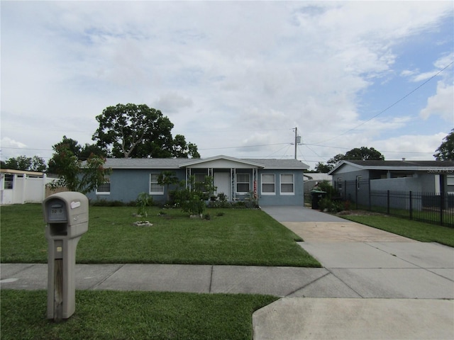5010 Shoshone St, Orlando, FL 32819 - ranch-style home featuring driveway and stucco siding