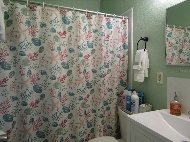 5010 Shoshone St, Orlando, FL 32819 - full bathroom with vanity and curtained shower