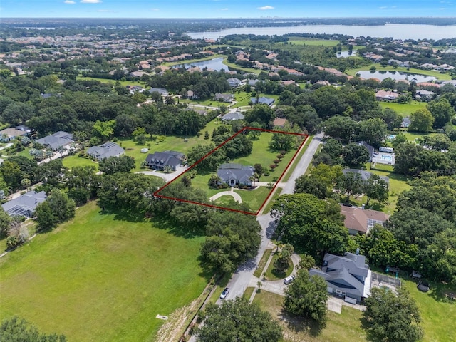 5141 Autumn Ridge Ln, Windermere, FL 34786 - aerial view of residential area featuring a large body of water and property boundaries highlighted