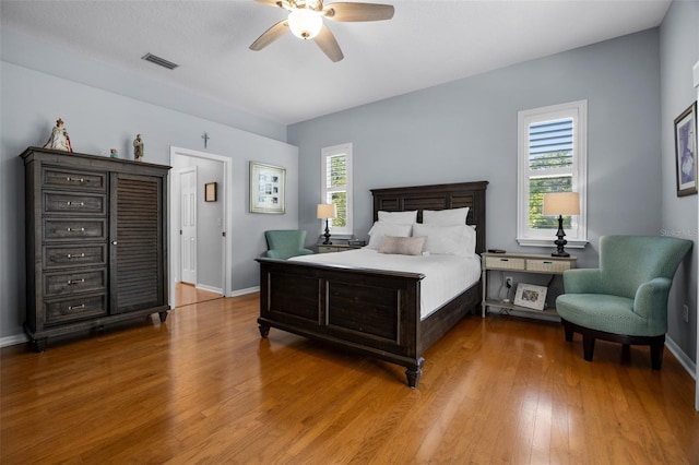 5141 Autumn Ridge Ln, Windermere, FL 34786 - bedroom featuring wood finished floors and ceiling fan