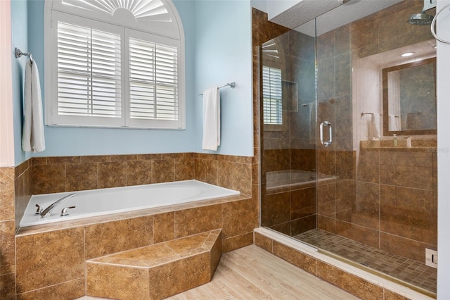 5141 Autumn Ridge Ln, Windermere, FL 34786 - bathroom with a garden tub and a shower stall
