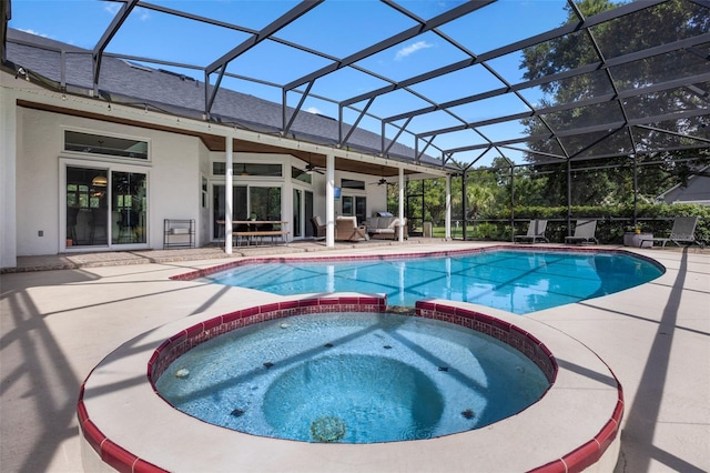 5141 Autumn Ridge Ln, Windermere, FL 34786 - view of swimming pool with ceiling fan, a pool with connected hot tub, a patio, and glass enclosure