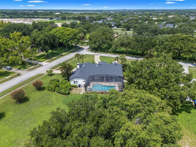 5141 Autumn Ridge Ln, Windermere, FL 34786 - bird's eye view of a pool area and a tree filled landscape