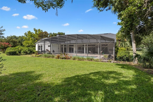 5141 Autumn Ridge Ln, Windermere, FL 34786 - back of house with a yard, an outdoor pool, and glass enclosure