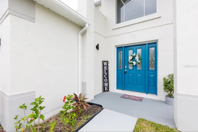 365 Aylesbury Ct, Kissimmee, FL 34758 - entrance to property featuring stucco siding