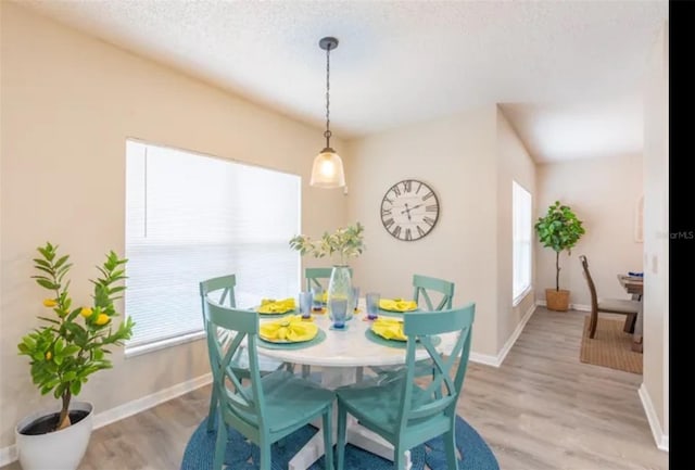 365 Aylesbury Ct, Kissimmee, FL 34758 - dining space featuring healthy amount of natural light and light wood-style flooring