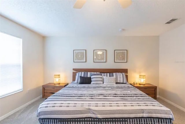 365 Aylesbury Ct, Kissimmee, FL 34758 - bedroom featuring carpet, ceiling fan, and a textured ceiling