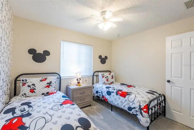 365 Aylesbury Ct, Kissimmee, FL 34758 - bedroom with light carpet, a textured ceiling, and ceiling fan