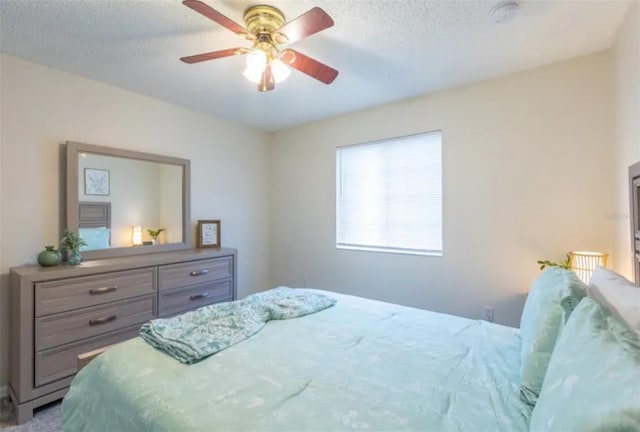 365 Aylesbury Ct, Kissimmee, FL 34758 - bedroom featuring a textured ceiling and ceiling fan