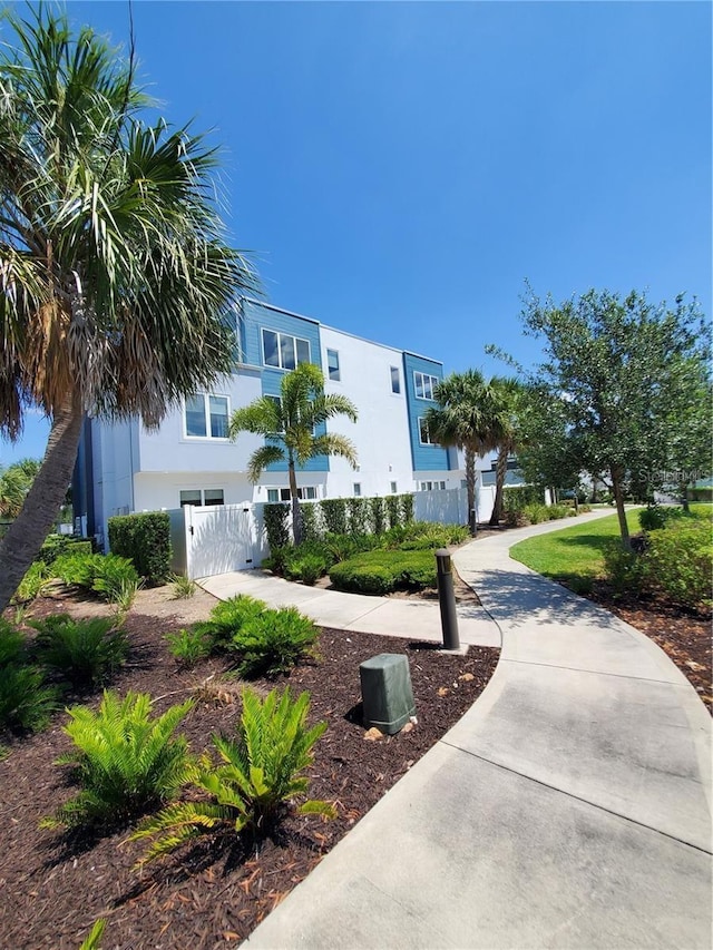 7740 Sandy Ridge Dr Unit 102, Reunion, FL 34747 - view of property with an attached garage
