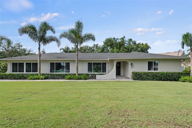 91 Minnehaha Cir, Maitland, FL 32751 - ranch-style house featuring stucco siding and a front yard