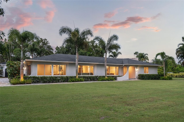 91 Minnehaha Cir, Maitland, FL 32751 - ranch-style home featuring stucco siding and a yard