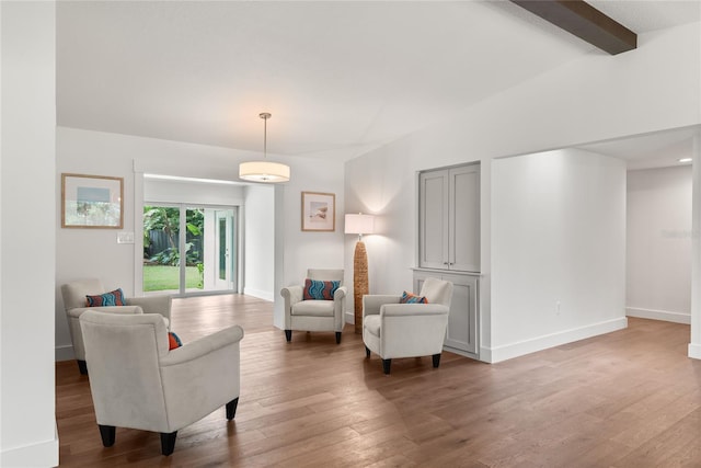 91 Minnehaha Cir, Maitland, FL 32751 - living area with wood finished floors and beamed ceiling