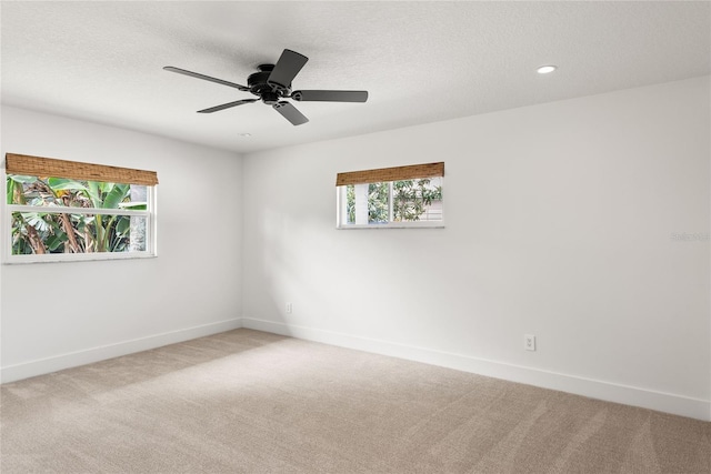 91 Minnehaha Cir, Maitland, FL 32751 - carpeted empty room with a textured ceiling, a ceiling fan, and recessed lighting