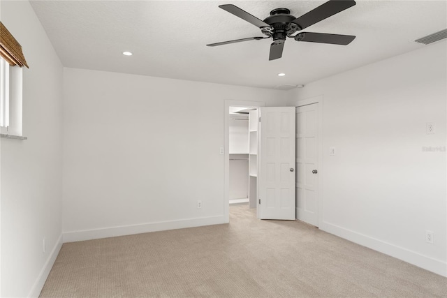 91 Minnehaha Cir, Maitland, FL 32751 - unfurnished bedroom featuring light carpet, recessed lighting, a spacious closet, a closet, and ceiling fan