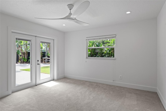 91 Minnehaha Cir, Maitland, FL 32751 - carpeted spare room with plenty of natural light, french doors, a ceiling fan, a textured ceiling, and recessed lighting
