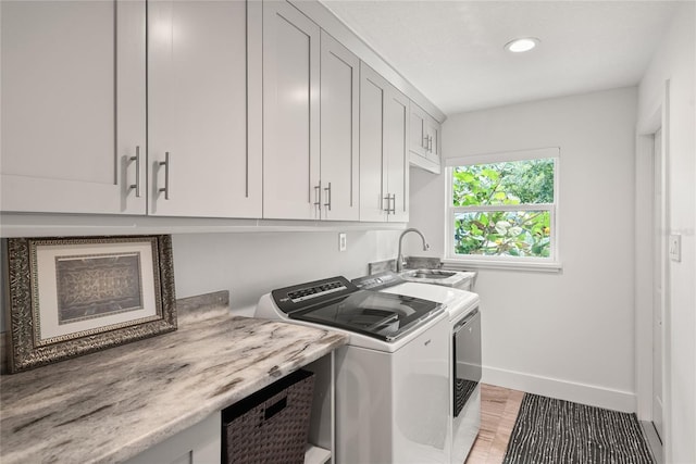 91 Minnehaha Cir, Maitland, FL 32751 - washroom featuring washing machine and dryer, cabinet space, and recessed lighting