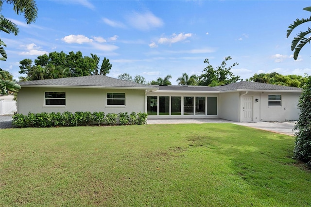 91 Minnehaha Cir, Maitland, FL 32751 - back of property featuring stucco siding, a yard, and a patio