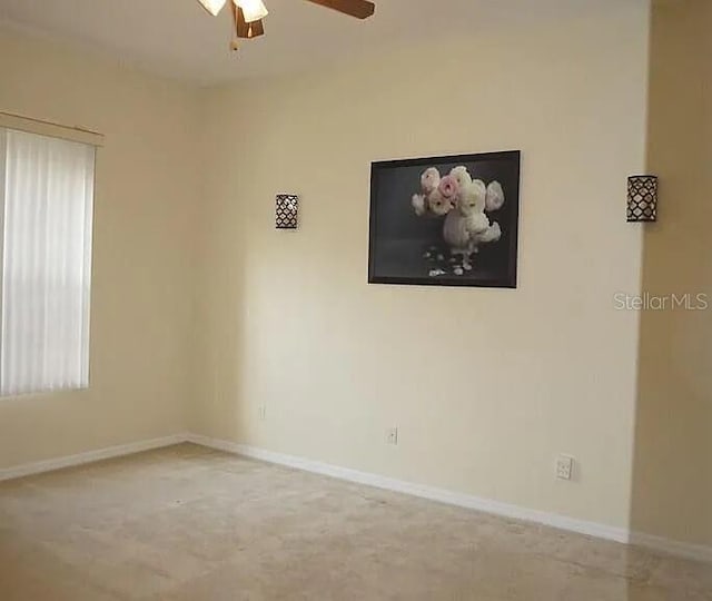 37 Ethan Allen Dr, Palm Coast, FL 32164 - empty room featuring ceiling fan and baseboards