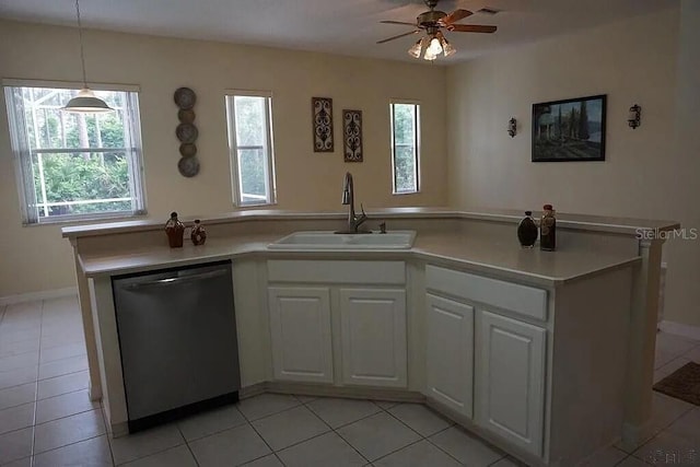 37 Ethan Allen Dr, Palm Coast, FL 32164 - kitchen featuring dishwasher, a ceiling fan, and light tile patterned flooring