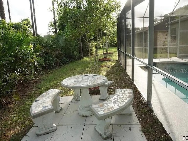 37 Ethan Allen Dr, Palm Coast, FL 32164 - view of patio / terrace with an outdoor pool