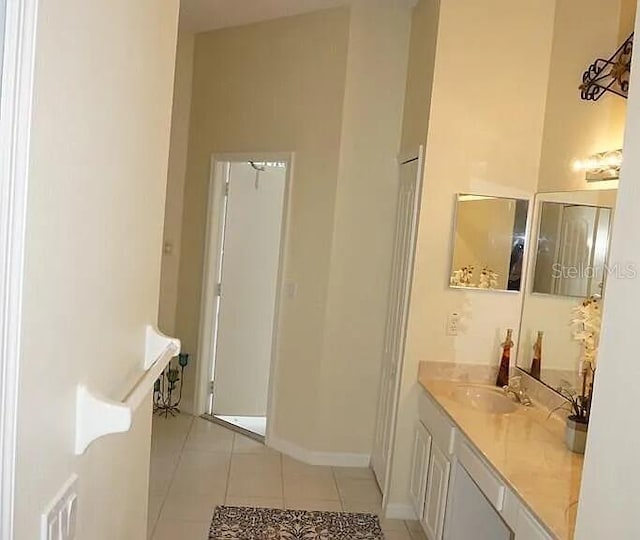 37 Ethan Allen Dr, Palm Coast, FL 32164 - bathroom with vanity and tile patterned flooring