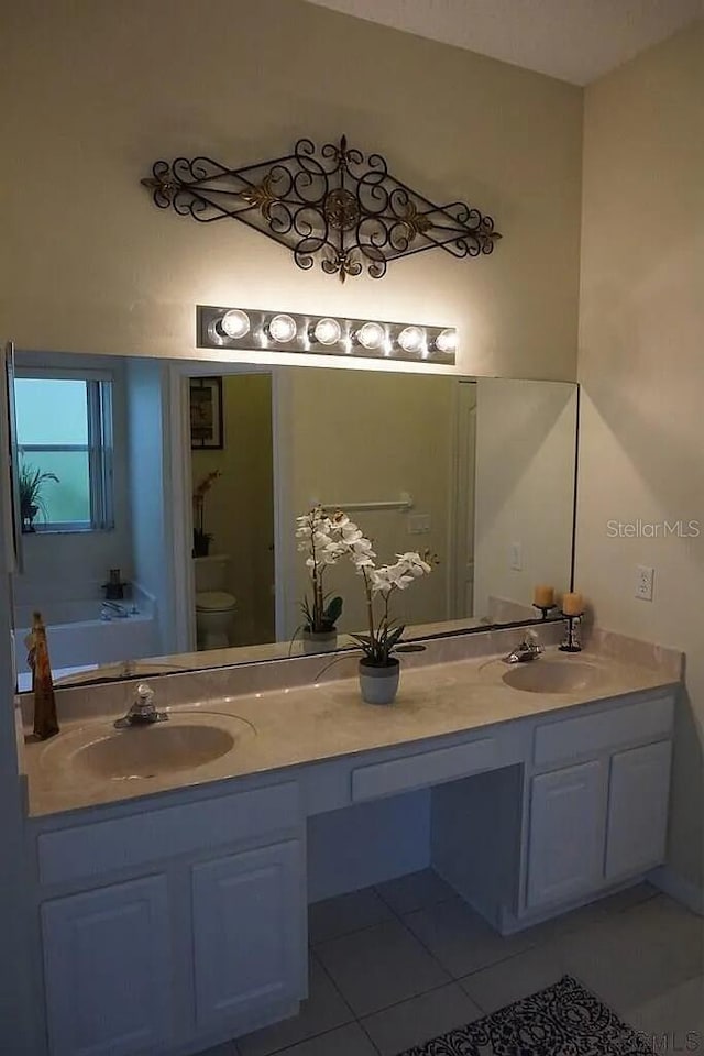 37 Ethan Allen Dr, Palm Coast, FL 32164 - full bath featuring tile patterned flooring and double vanity