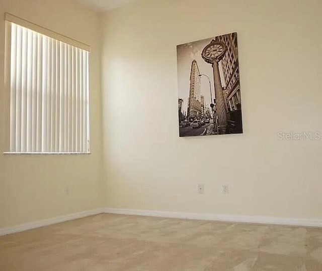 37 Ethan Allen Dr, Palm Coast, FL 32164 - spare room with baseboards