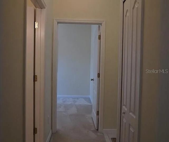 37 Ethan Allen Dr, Palm Coast, FL 32164 - corridor with baseboards