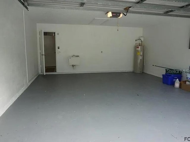 37 Ethan Allen Dr, Palm Coast, FL 32164 - garage with water heater and a garage door opener