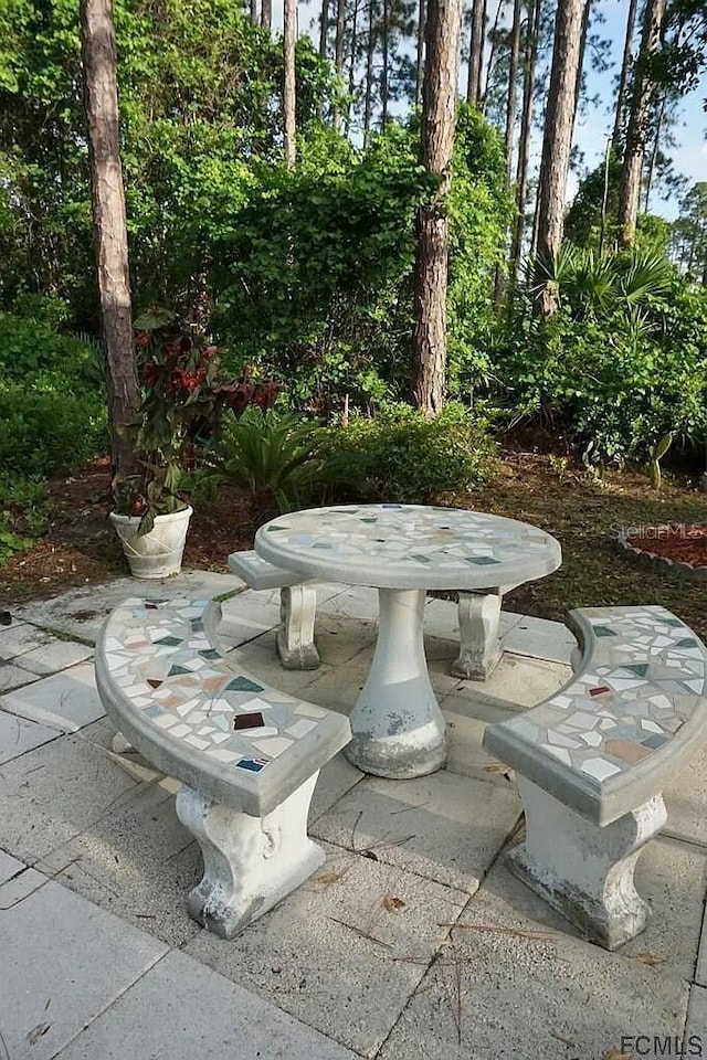 37 Ethan Allen Dr, Palm Coast, FL 32164 - view of patio / terrace featuring outdoor dining space