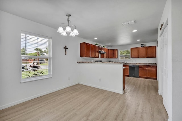 9 Summerset Ter, Casselberry, FL 32707 - kitchen featuring black dishwasher, light wood finished floors, recessed lighting, under cabinet range hood, and a peninsula