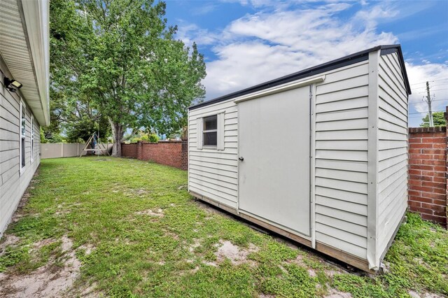 9 Summerset Ter, Casselberry, FL 32707 - view of shed featuring a fenced backyard