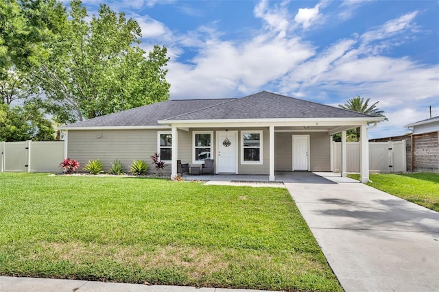 9 Summerset Ter, Casselberry, FL 32707 - view of front of home featuring a gate, concrete driveway, a porch, a shingled roof, and an attached carport