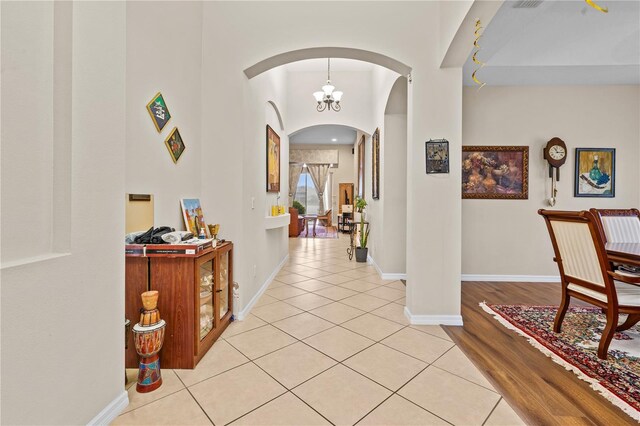 8804 Warwick Shore Xing Unit X, Orlando, FL 32829 - corridor with arched walkways and light tile patterned floors