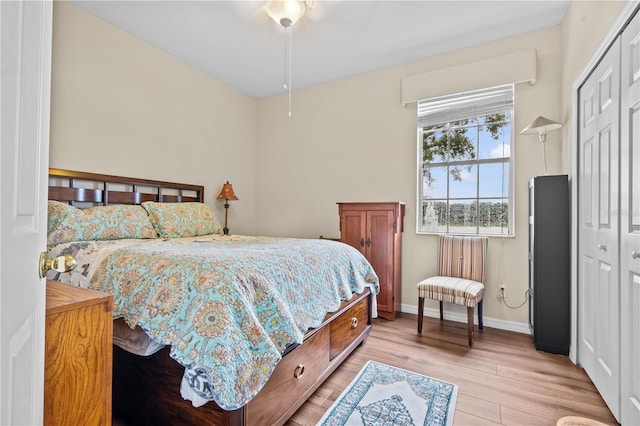 8804 Warwick Shore Xing Unit X, Orlando, FL 32829 - bedroom with a closet and light wood-style floors