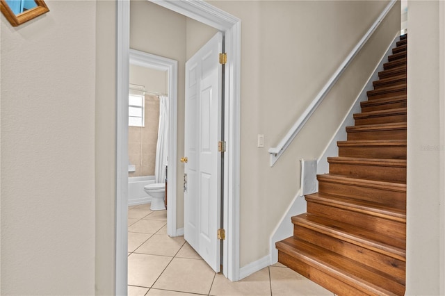 8804 Warwick Shore Xing Unit X, Orlando, FL 32829 - stairs featuring tile patterned floors and baseboards