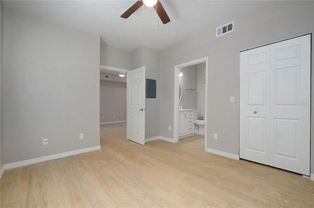 826 Camargo Way Unit 201, Altamonte Springs, FL 32714 - unfurnished bedroom with light wood-style floors, ensuite bathroom, electric panel, a ceiling fan, and a closet