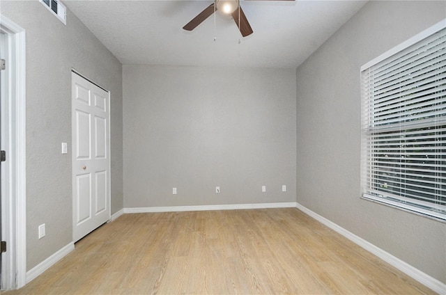 826 Camargo Way Unit 201, Altamonte Springs, FL 32714 - unfurnished bedroom featuring light wood-type flooring and a ceiling fan