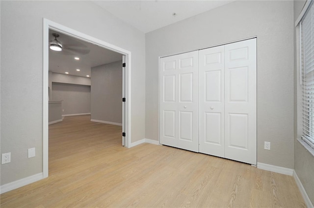 826 Camargo Way Unit 201, Altamonte Springs, FL 32714 - unfurnished bedroom featuring light wood-style flooring and a closet