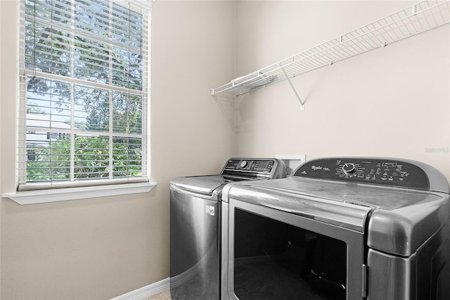 403 Courtlea Creek Dr, Winter Garden, FL 34787 - laundry room with separate washer and dryer and baseboards
