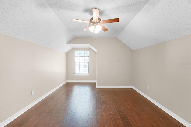 403 Courtlea Creek Dr, Winter Garden, FL 34787 - additional living space with a textured ceiling, ceiling fan, dark wood finished floors, and vaulted ceiling