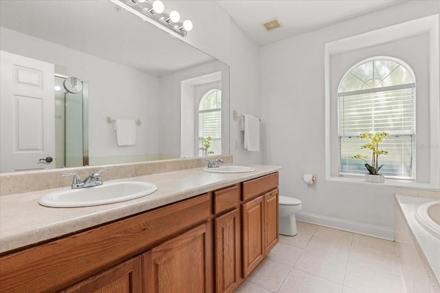 7348 Regina Way, Orlando, FL 32819 - bathroom featuring double vanity, tile patterned floors, a bath, and a shower with shower door