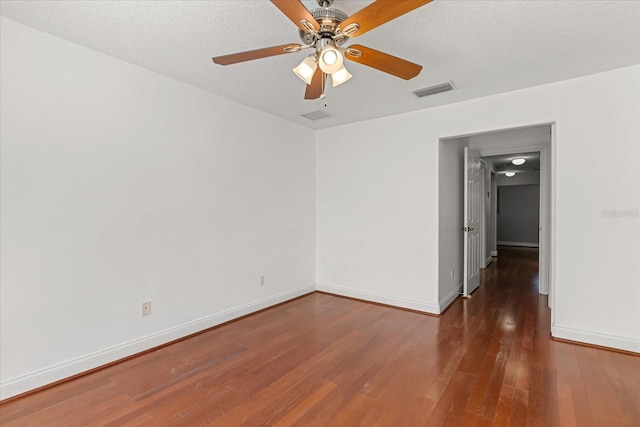 7348 Regina Way, Orlando, FL 32819 - spare room with wood finished floors and ceiling fan