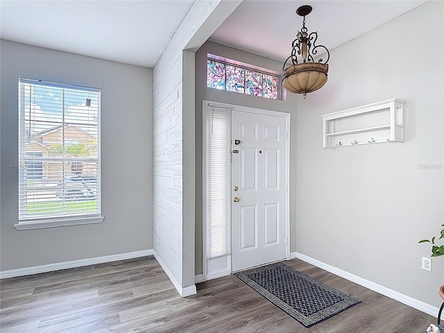 799 Hacienda Cir, Kissimmee, FL 34741 - foyer entrance featuring wood finished floors