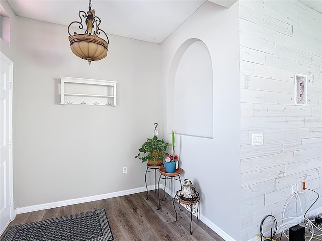 799 Hacienda Cir, Kissimmee, FL 34741 - hall featuring dark wood-style floors and arched walkways